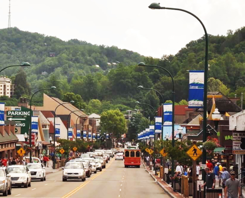Visitors line the streets of Downtown Gatlinburg.