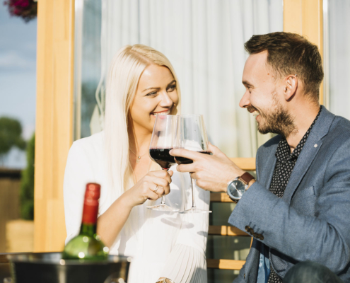 A couple enjoying glasses of wine at a Gatlinburg winery.