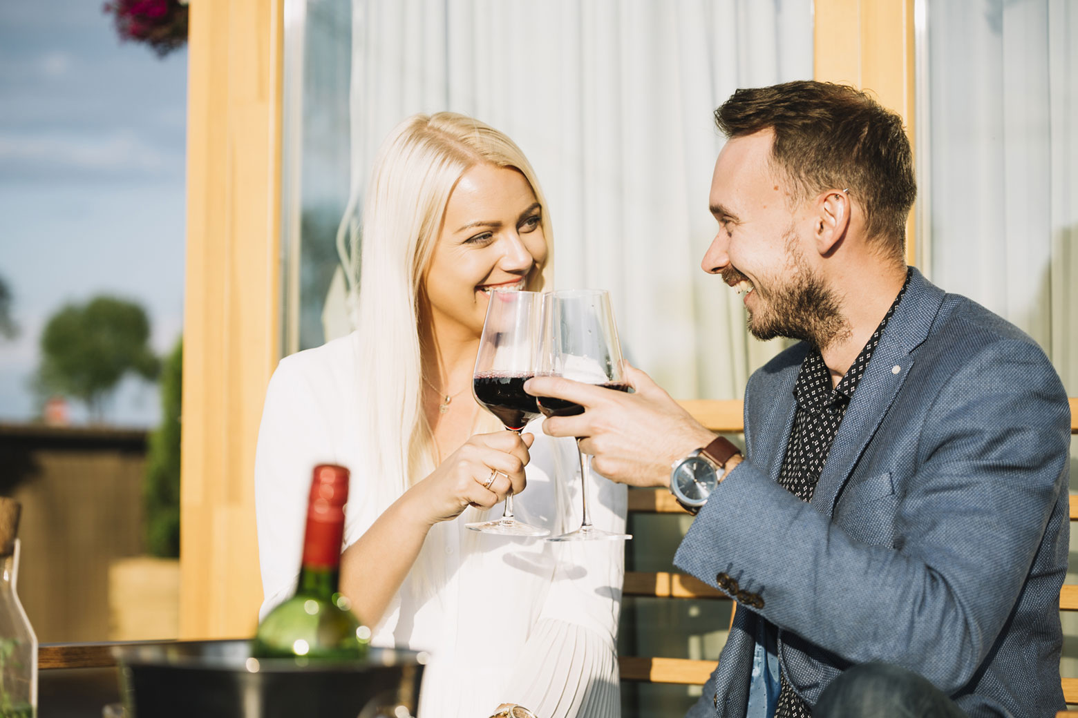 A couple enjoying glasses of wine at a Gatlinburg winery.